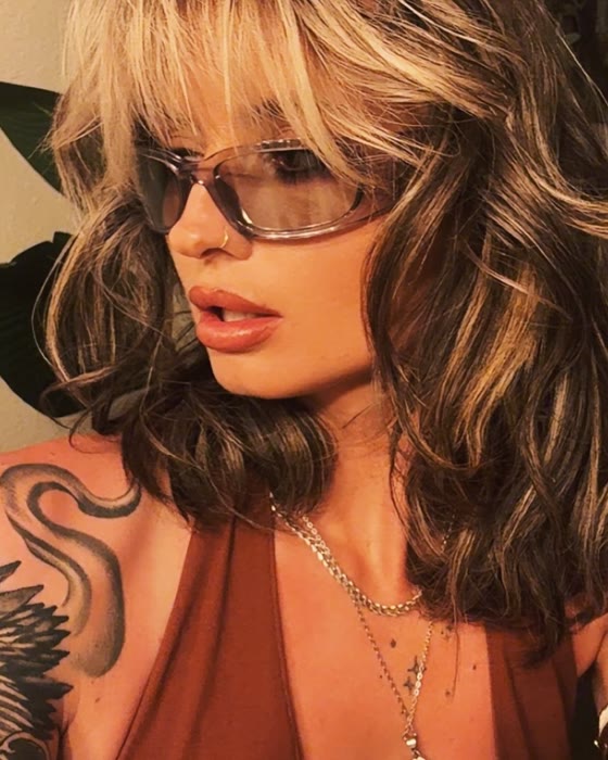 Kenzi, tattoo artist at Moxy Tattoo Studio.