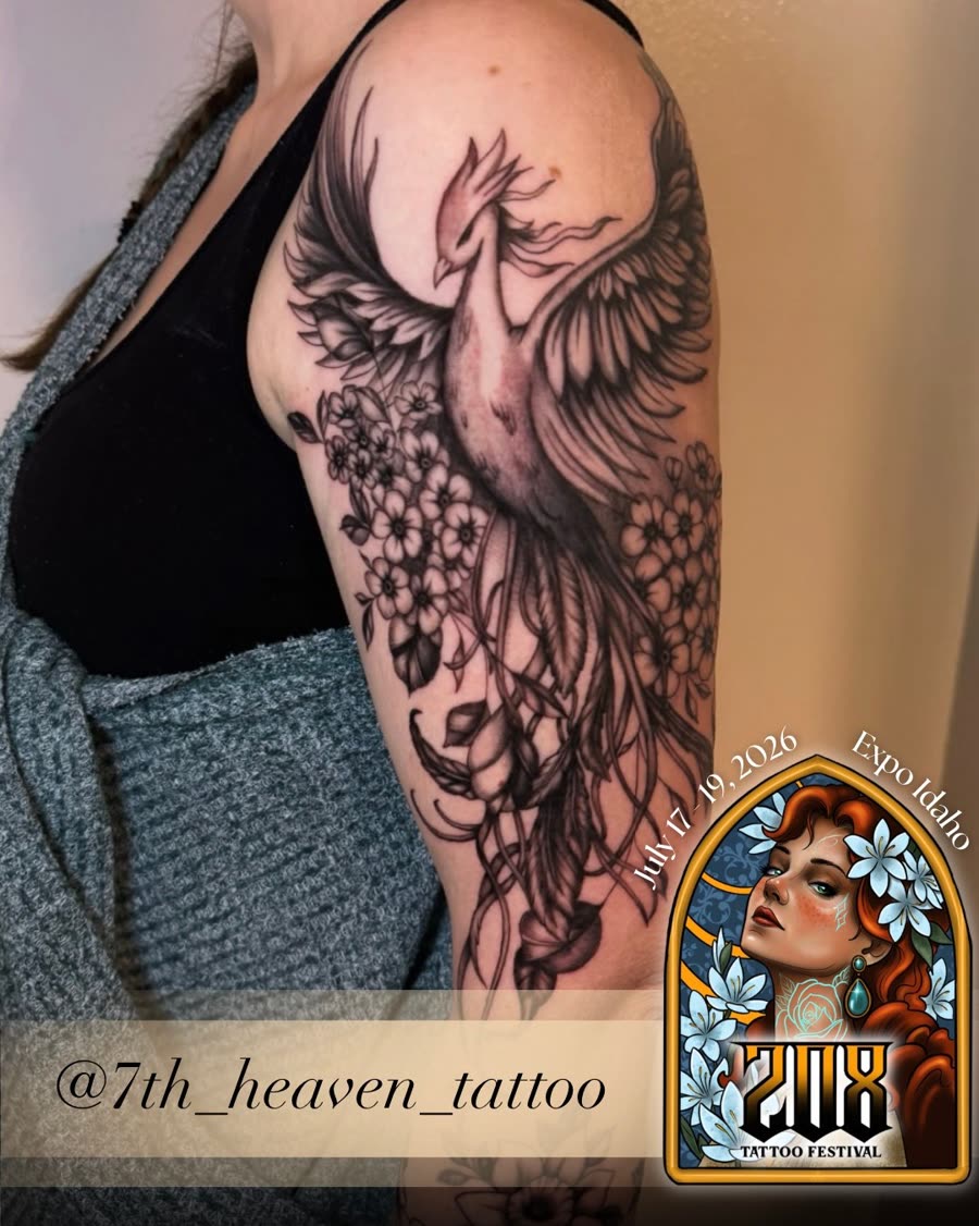 Ornamental black and grey sleeve with lace and floral detail.